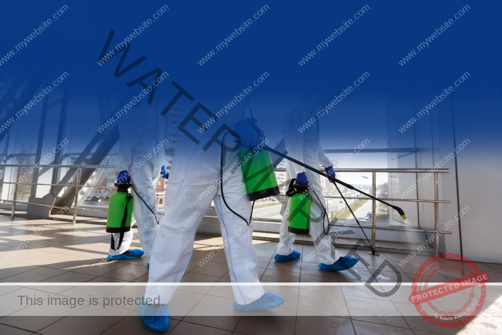 Header men in respirators and protective suits cleaning p RUFCBNG